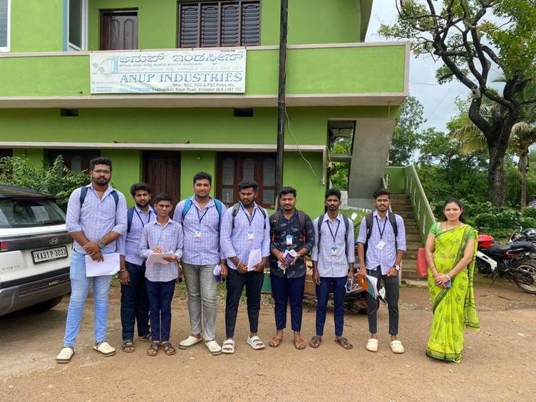 Students outside Anup Industries during the one-week economics internship