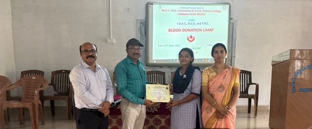 Certificate being given to a volunteer who donated blood