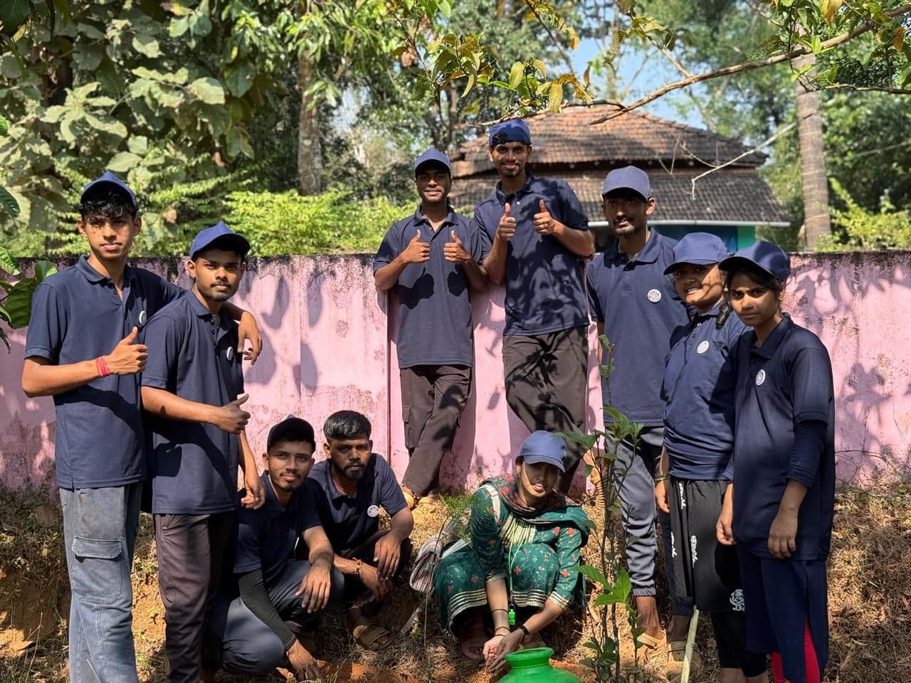 NSS volunteers planting saplings at the special camp, 2025