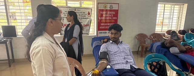 A volunteer donating blood, April 2026